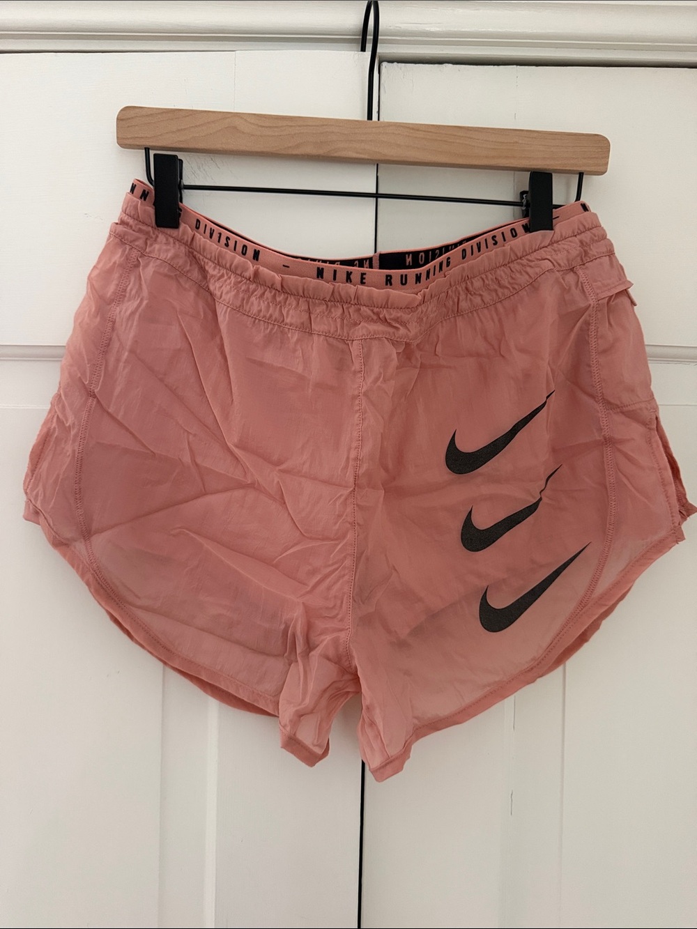 Nike Women’s Pink Athletic Running Shorts with Black Swooshes
